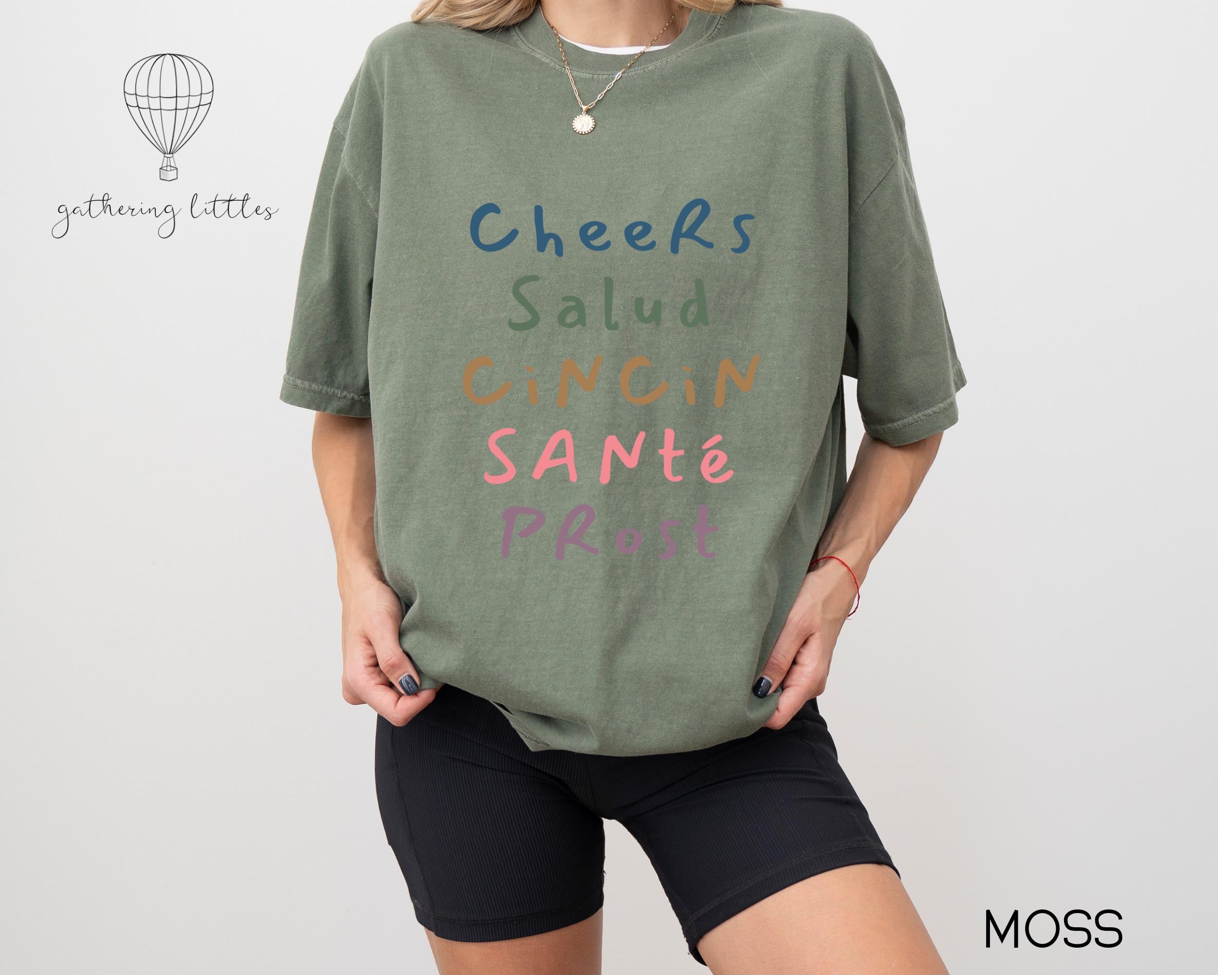 Cheers Shirt, Comfort Colors Drinks Tshirt, Champagne Lover Gift, Bartender Crewneck, Bachelorette Tee, Cheers New Years Eve Shirt, salud