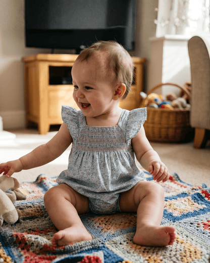 Floral Blue Dove Smocked Flutter Romper