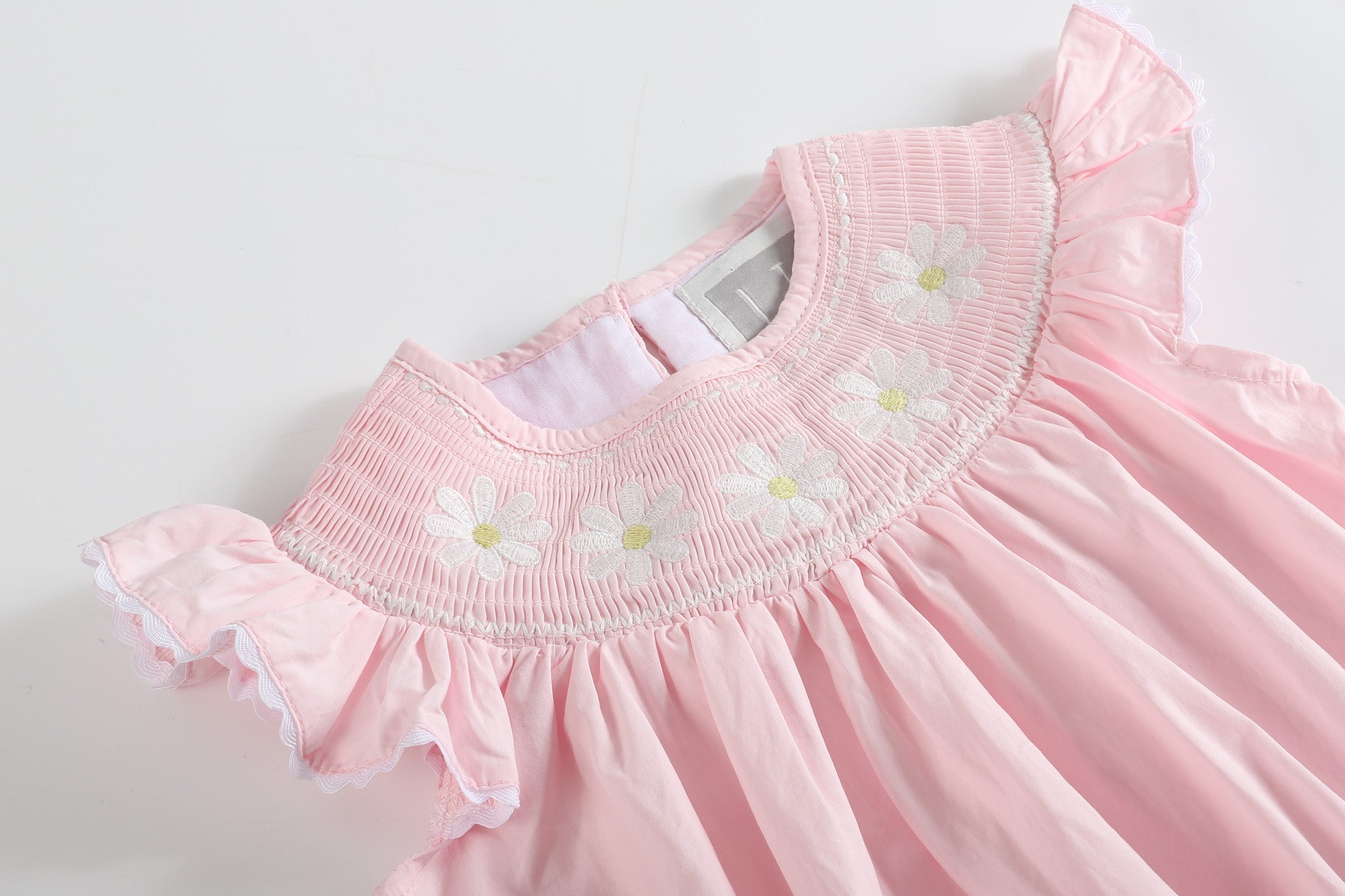 Light Pink Daisy Smocked Ruffle Romper