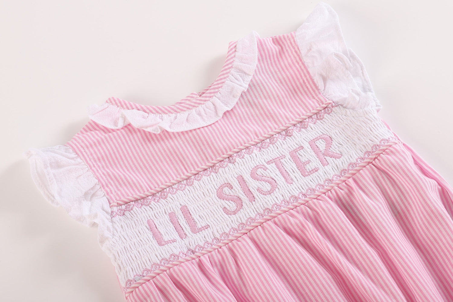 Pink Striped Lil Sister Smocked Romper